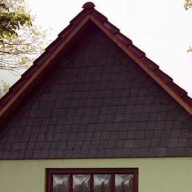 Fassadengestaltung mit Schiefer durch die Dachdeckerei Jean Kuhla aus Kuhstorf